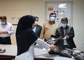 اهدای بسته حمایتی به خانواده مدافعان سلامت بیمارستان نمازی