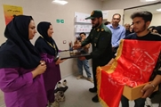 آیین باشکوه پرچم‌گردانی بسیجیان پایگاه امام علی(ع) استهبان در بیمارستان شهدای سلامت نی ریز به مناسبت میلاد حضرت زینب(س)